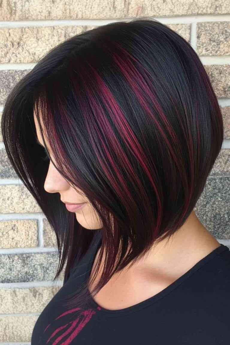 Trending Highlight Colors for Black Hair in 2025 Deep burgundy highlights with an edgy