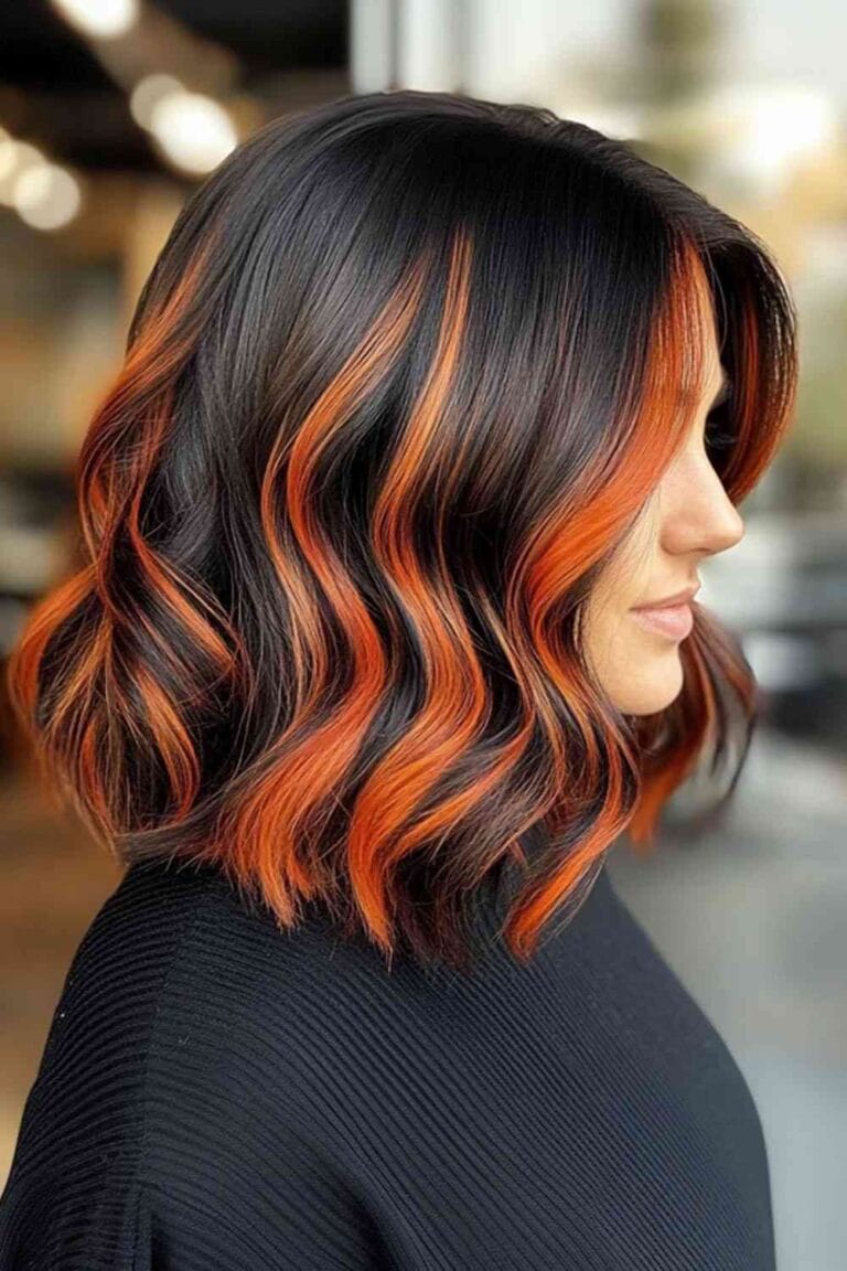 Trending Highlight Colors for Black Hair in 2025 Fiery copper highlights with a blunt cut