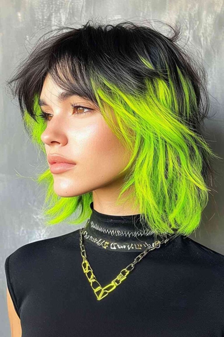 Trending Highlight Colors for Black Hair in 2025 Neon green highlights with an edgy shag