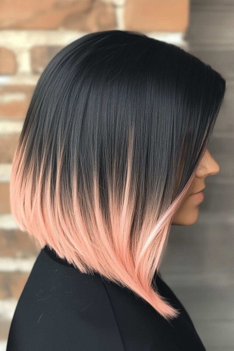 Trending Highlight Colors for Black Hair in 2025 Peachy pink tips with a soft A line bob